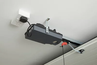 Motorisation pour porte de garage sectionnelle