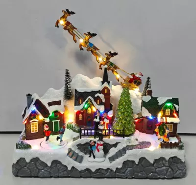 Village de noël lumineux patineur tournants et rennes Feeric Light & Christmas