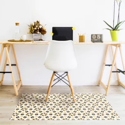 Tapis vinyle motif graphique beige, orange et noire L.95 x l.66 cm x ep. 2 mm