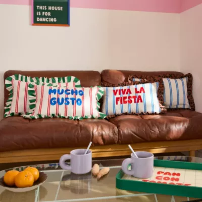 Coussin Taxi Brousse brodé - Viva la Fiesta - rayé bleu avec volants léopard