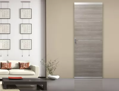 Système coulissant pour pose invisible porte en bois